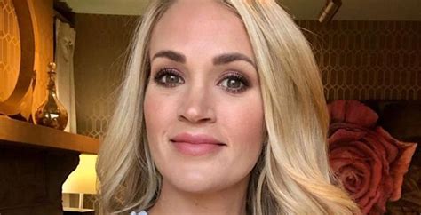 carrie underwood in a bra|Carrie Underwood Puts Taut Abs On Display In Bra Photo.